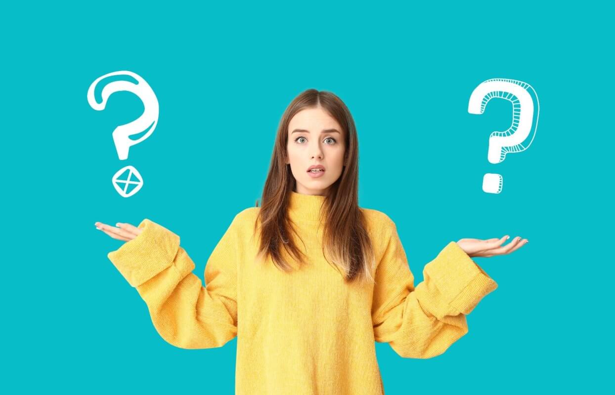 A young woman wearing a yellow sweater stands against a teal background with a confused expression. She has her hands raised, and question marks are drawn on either side of her.