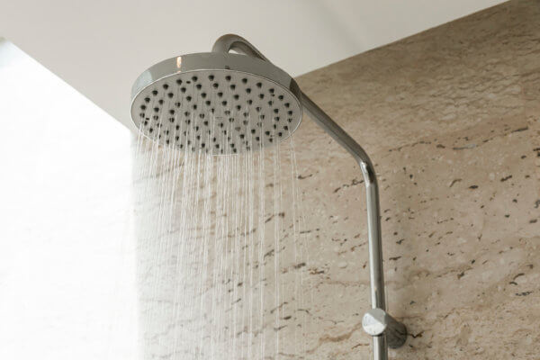  Image of shower head with running water